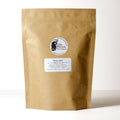 Bag of Lake Missoula Tea Company's Rose Chai in 500g packaging with a blend of rose petals and chai spices.