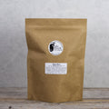 Lake Missoula Tea Company's Skin Glow herbal tea in a 500g package, featuring a blend of natural ingredients for radiant skin.
