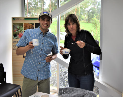 Tasting at Lake Missoula Tea Company factory featuring Caldera Mist Chocolate Abyss tea in a tasting cup.