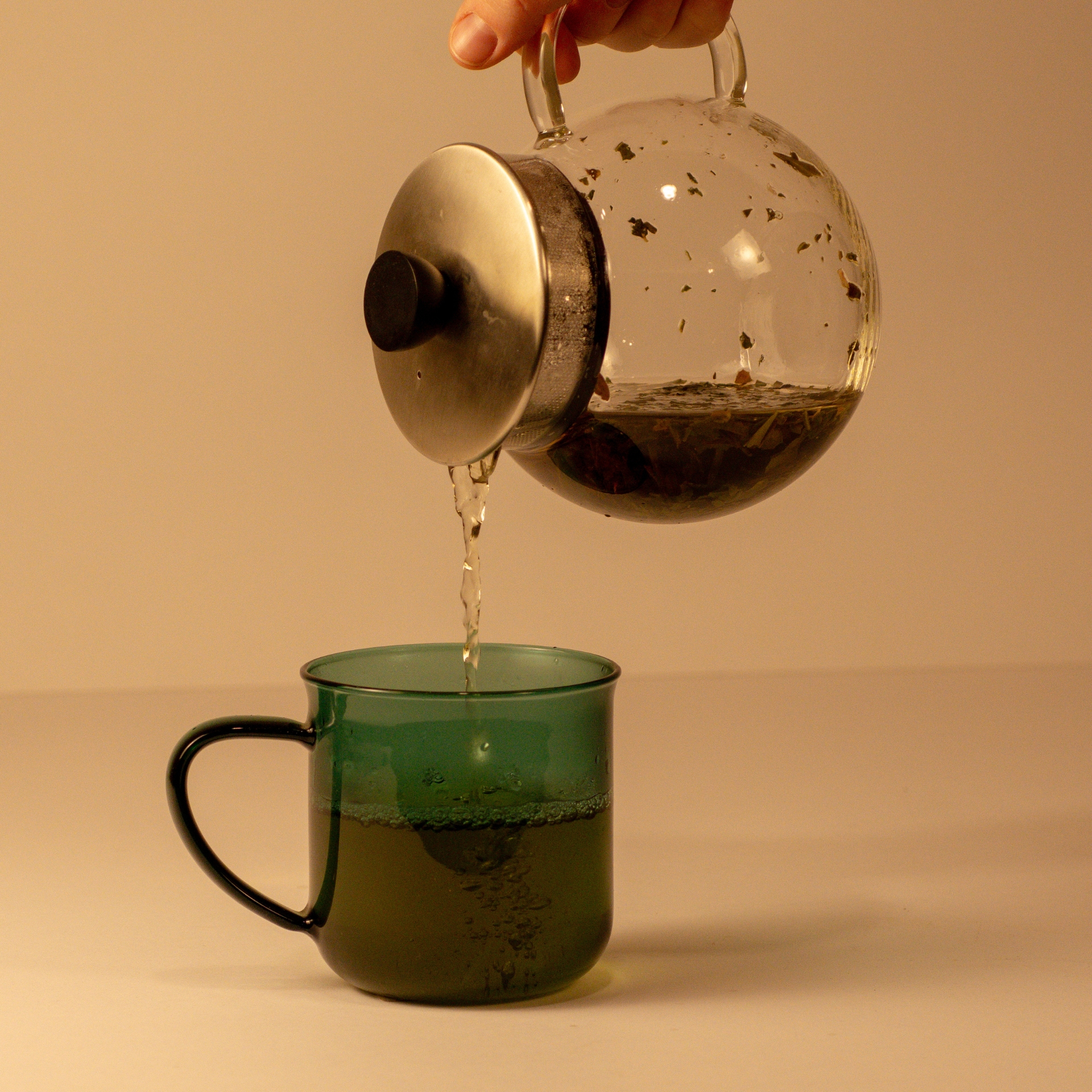 Sweet Cherry Blossom brewing in a glass teapot