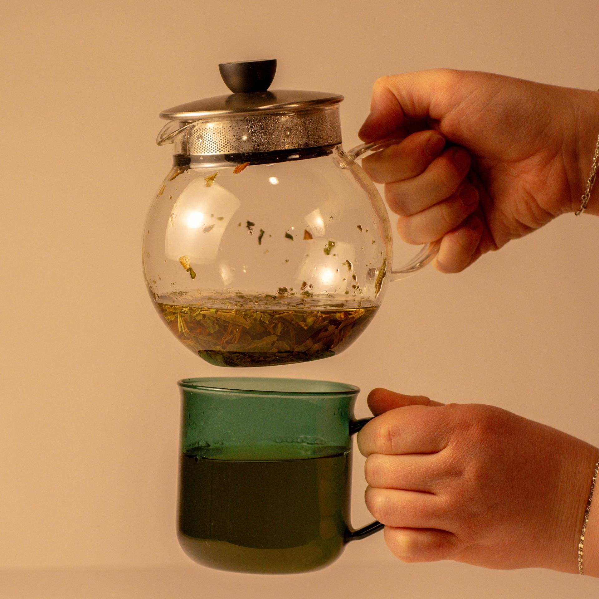 Sweet Cherry Blossom brewing in a glass teapot
