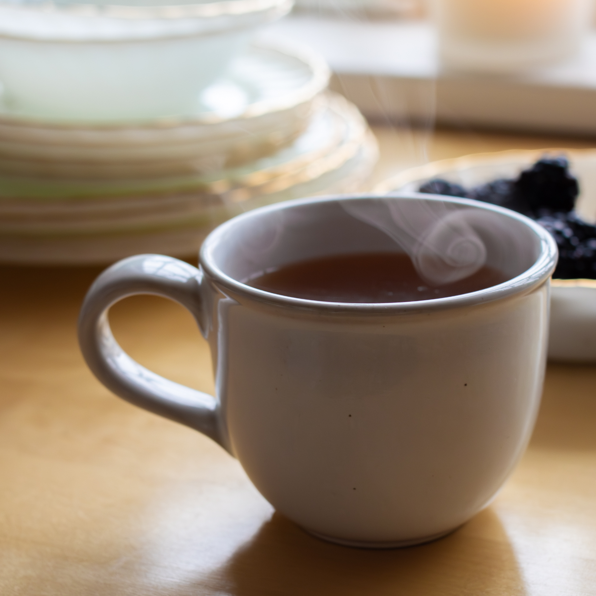 a cup of tea with steam